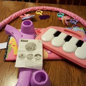 kick n play piano gym pink